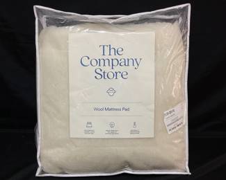 DILA111 The Company Store Wool Mattress Pad New, never used, full size, made from Australian wool. Bag is opened. Measures 54 x 75
