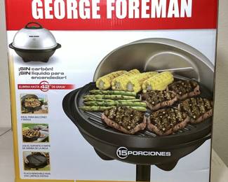 MAGR129 George Foreman Outdoor Indoor Grill Electric grill for table top or place on stand. Grill plate measures 17.5 inches. Looks to be hard,y used, Comes with original box
