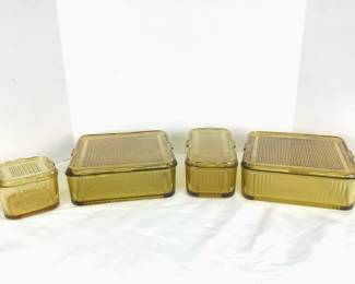 DILA801 Vintage Refrigerator Dishes Set of vintage, light amber colored refrigerator dishes. Includes large dishes, one long dish, and one small dish. 
