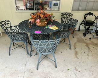Nice Vintage wrought iron patio table with 5 chairs