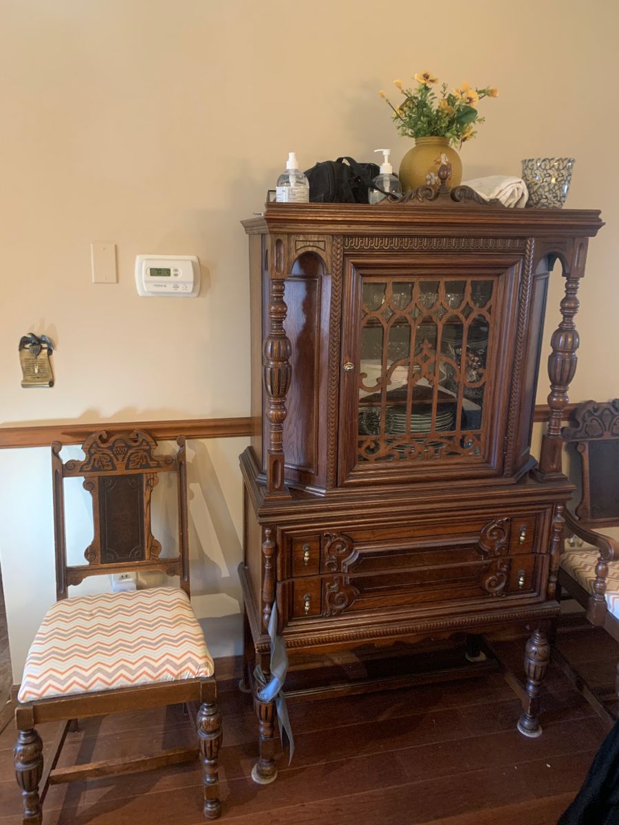 100 year old solid oak table, 6 chairs, China cupboard and buffet 