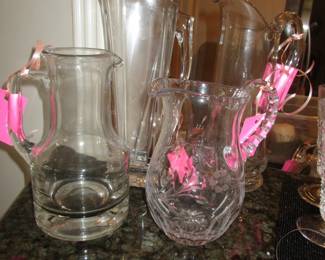 Various glass water and drink pitchers