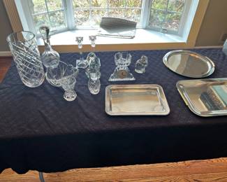 Collection of crystals and silver platters 