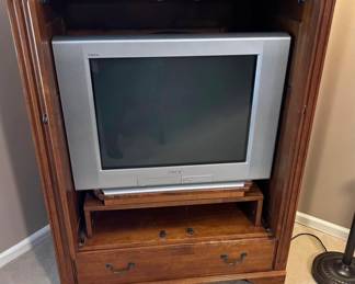 53 by 42 inch Ethan Allen entertainment cabinet with 27 inch Sony TV ( Trinitron).