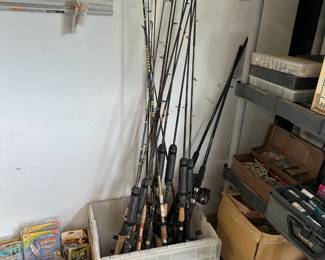 lots of fishing rods, reeds, lures, etc.