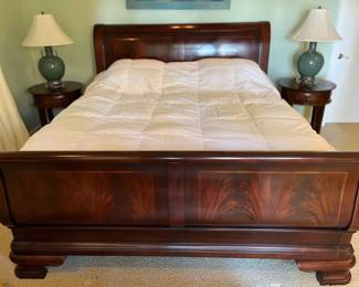 king sized sleigh bed, matching side tables, matching ceramic table lamps