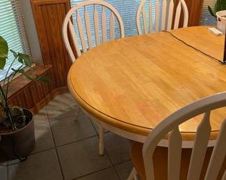 White and tan farm table with 6 chairs