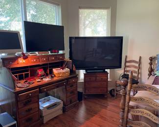 Three smart TVs, Ethan Allen rolltop desk