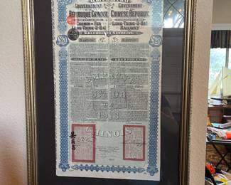 Chinese stock certificate framed. This has 40 stock certificates on the back of it.