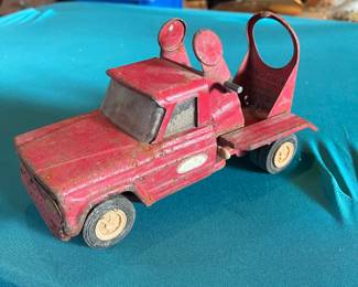 Vintage metal toy tow truck