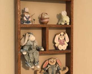 wooden shelf with rabits 