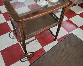 antique tea cart w spoke wheels and a Teavara tea set in original box