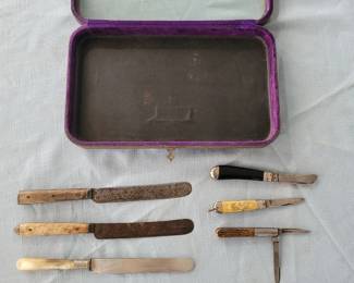 old pearl handle, bone handle, and pocket knives