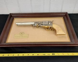 2 realistic replica revolvers, 1 is Wyatt Earp and the other is Wild Bill Hickok