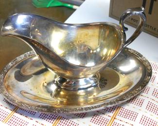 Silverplate Gravy boat.  I have not cleaned any of these items because everyone uses a different process to clean their silver items.  This one will polish up very nice.