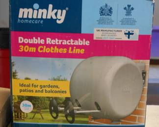 Retractable Clothes Line, Brand New in rough box.