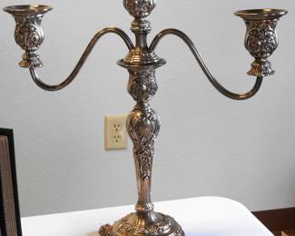 Wm. Rogers & Sons Convertible Candelabra.  This can be used as a candlestick or as a 3 candle candelabra.  This piece is stunning, and would make a great piece to any collection.  Priced fairly, it will not last long.
