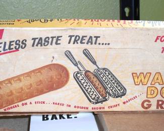 This Vintage Waffle Dog grill maker is a fun piece that will make your next camping trip even MORE fun!