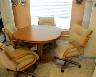 Breakfast Table with 4 leather swivel chairs