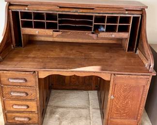Dad's old rolltop desk. It needs a little work but is a solid piece of furniture.