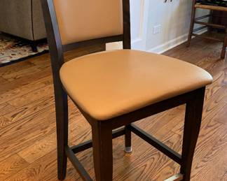 Faux Leather Upholstered Counter Stools with Brass Foot Rests - 3 Available. 24" Seat Height. Photo 1 of 3.