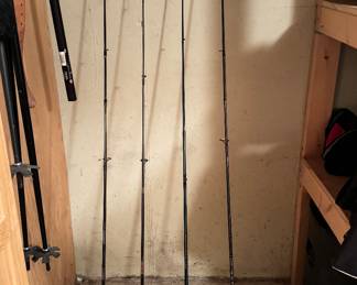 Three Shakespeare Synergy Supreme Fishing Pools with Regal 2000 Reels, One with Shakespeare E-Z Cast Reel.