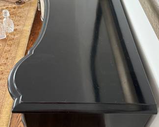 Lort Manufacturing Silver Leaf & Ebony Lacquered Wood Serpentine Front Chest of Drawers. Measures 42" W x 20.5" D x 35" H. Photo 2 of 5.