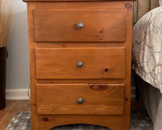 Pair of Three-Drawer Pine Bedside Tables. Each Measures 24" W x18" D x 29" H.