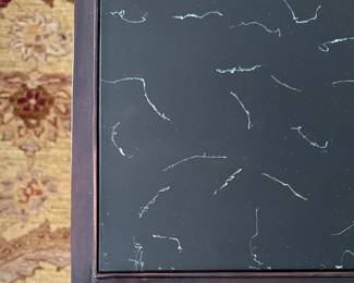 Agnes Stoltz Interiors Sourced Faux Marble Cocktail Table. Surface is Hand-Painted Glass on Wrought Iron Frame. Measures 39" x 32" x 22" H. Photo 2 of 4.