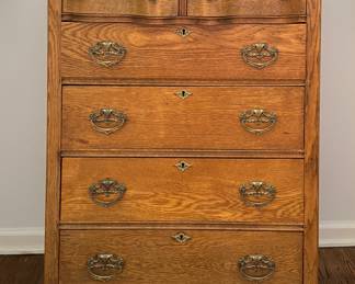 Antique Six-Drawer Oak Chest of Drawers with Serpentine Top & Brass Pulls. Measures 33" W x 20" D x 45" H. Photo 1 of 3.