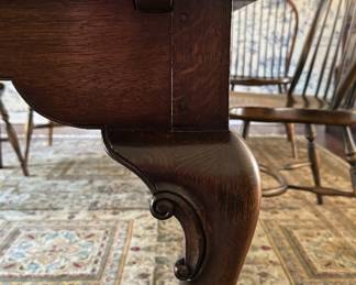 Vintage Queen Anne Style Oak Farm Table with Pad Feet and Two Self-Storing Pull Out Leaves. As Shown Measures 42" W x 80" x 30" H. Extends to 122" With Two 21" Hidden Leaves. Photo 2 of 5.