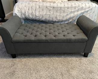 Grey tufted storage bench, $88