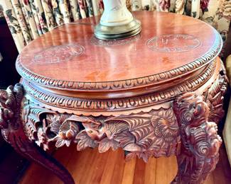 Ornately carved Asian Dragon table, available for pick up after the sale of the house, Available for purchase the days of the sale.