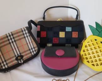 Burberry purse at the checkout desk. Other fun pieces. 