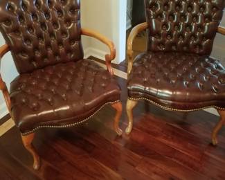 Great leather tufted chairs. Sold separately. 
