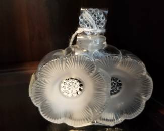 Lalique perfume. At checkout. 