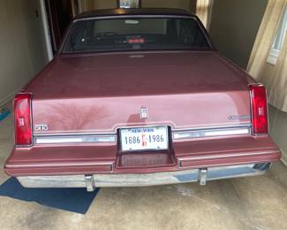 1986 V-8 Cutlass Supreme 3,664 original miles -- mint a BID item---silent auction ends Sunday noon if high bid meets owners reserve  SEE TERMS on this site