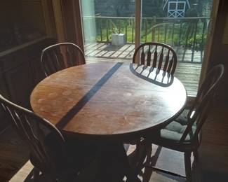 Dining Table with 3 leaves and 4 chairs