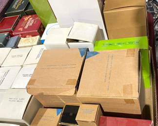 vintage Avon figurines and perfumes in boxes