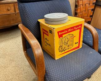 Rolling desk chair, Brownie projector