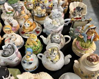 Cat figurines, banks, lidded trinket boxes, etc.