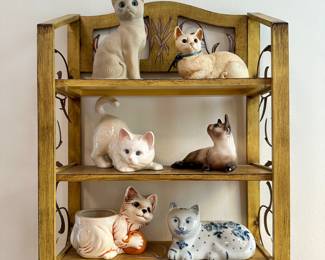 Decorative shelf and cat figurines