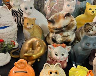 Cat figurines, banks, lidded trinket boxes, etc.