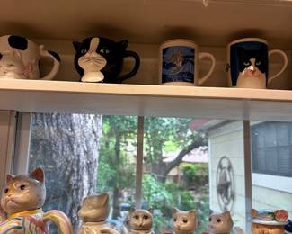 Cat mugs and figurines