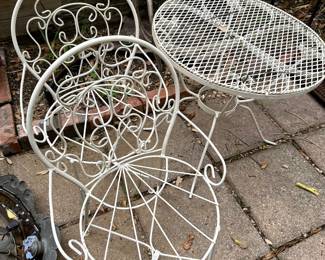 Child’s size wrought iron table and chairs