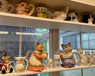 Cat mugs and figurines