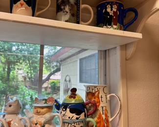 Cat mugs and figurines