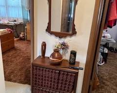 Bookd and Antique Mirror