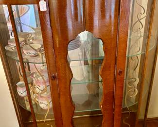 antique carved rounded display cabinet