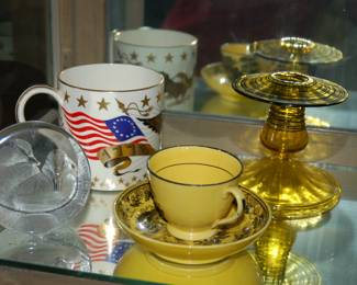 Canary cup & saucer, Steuben